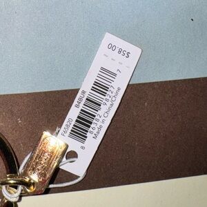 Coach Purple Enamel Turnlock Keychain